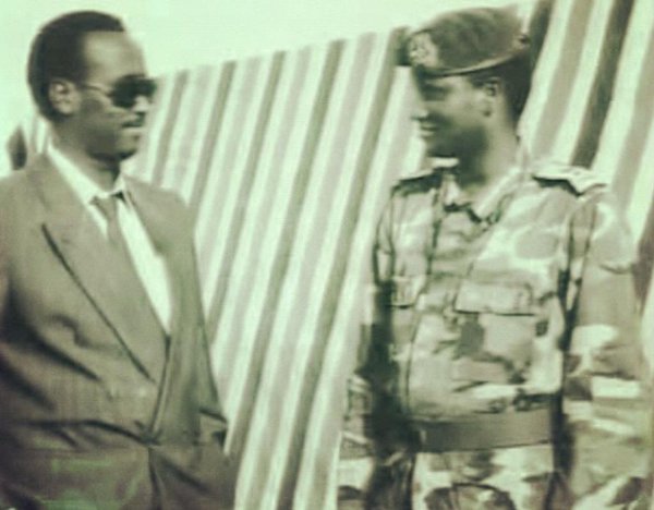 Fred Rwigyema (right) chats with Gen Salim Saleh back in the day