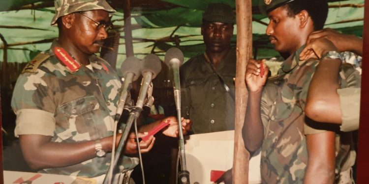 Fred Rwigyema being decorated by President Museveni as one of the first Major Generals in the NRA in the 1980s. CREDIT: Web image