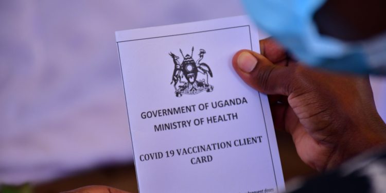 Uganda started the vaccination process against Covid-19 in March 2021 and upon vaccination this card is issued. CREDIT: Vox Populi Photographer